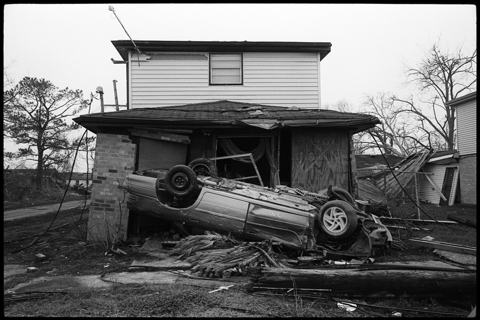 lower 9th ward after hurricane katrina - car on a house