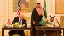 President Donald Trump and King Salman bin Abdulaziz Al Saud of Saudi Arabia sign a "joint strategic vision" agreement in May