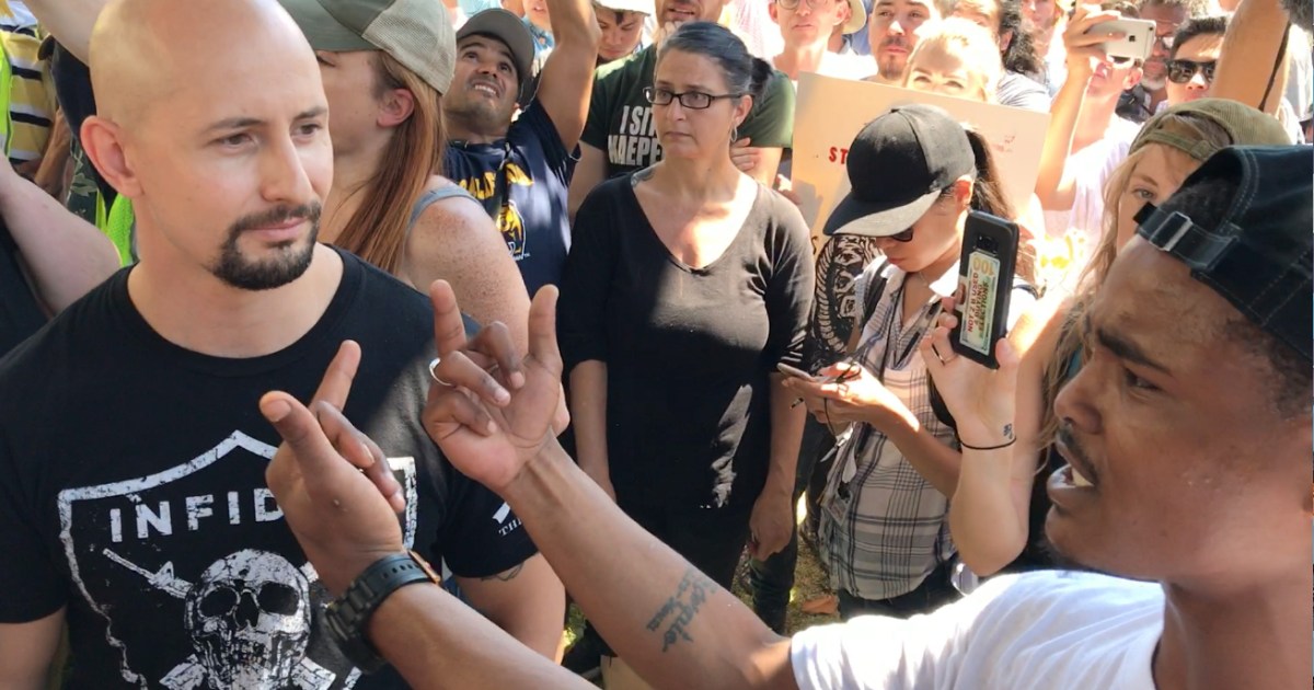 Johnny Benitez argues with counterprotesters in Berkeley on Sunday.