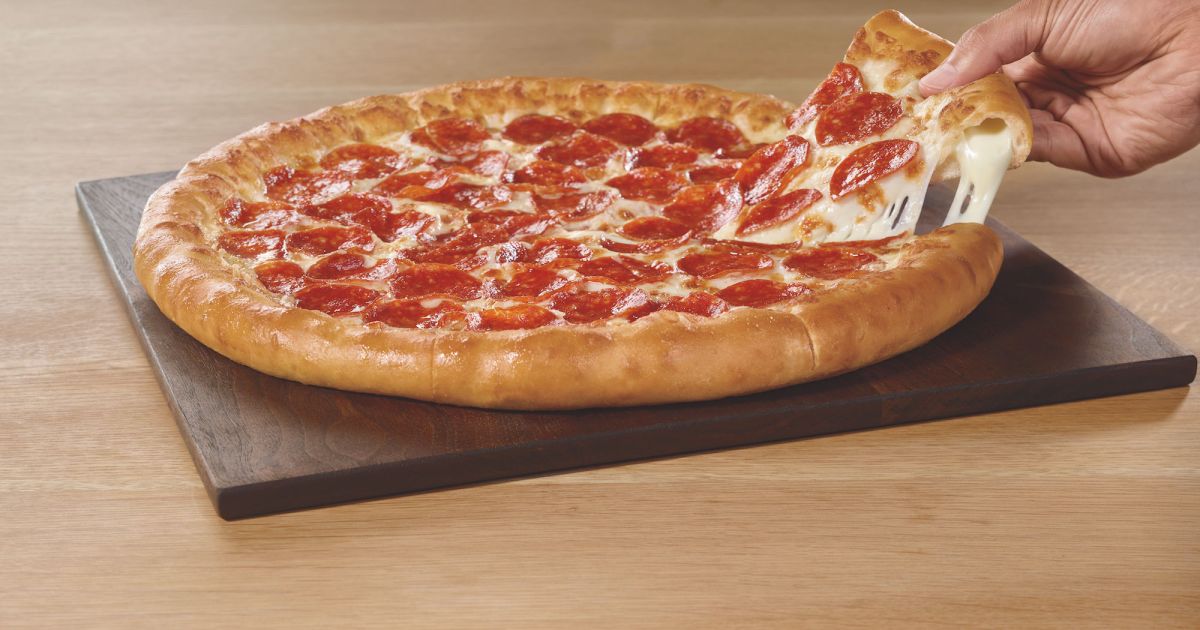 The Real Reason Pizza Hut Just Rolled Out The Extra Cheesy