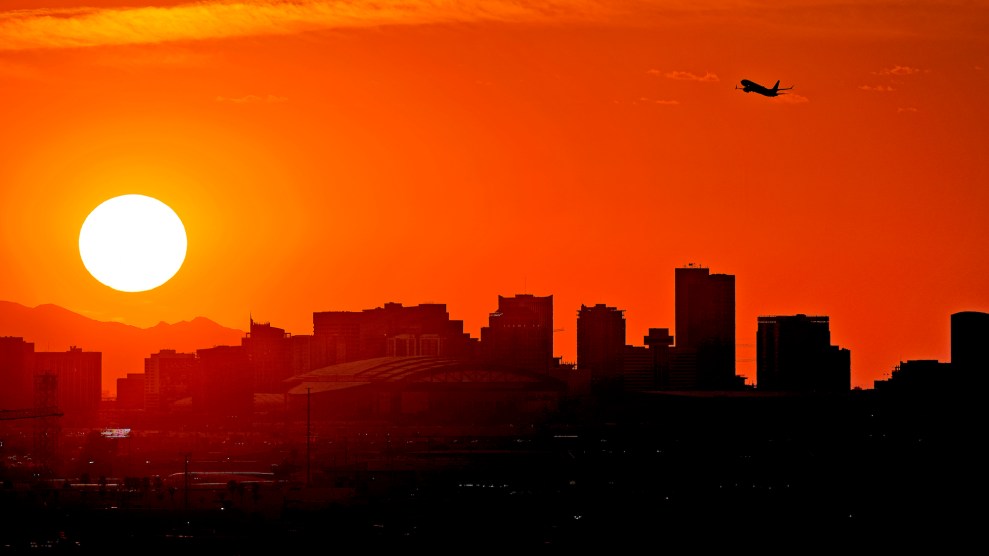 A sun in a red sky over Phoenix.
