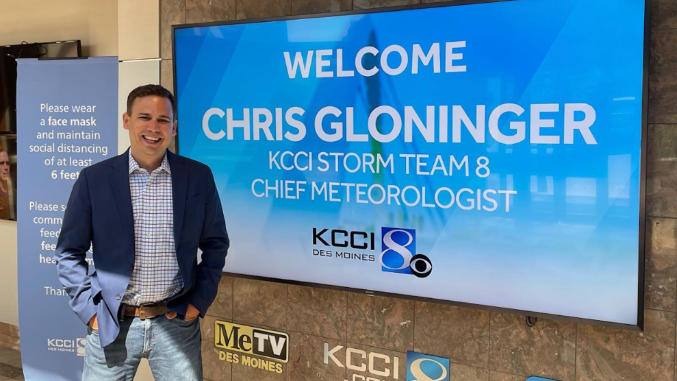 A photo of Chris Gloninger next to a TV that says, "Welcome Chris Gloninger"