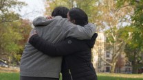 Cristobal hugs his mom, Kary, at the park in front of their apartment building in the Bronx on a Saturday afternoon.