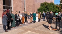 Plaintiffs and their representation stand in front of the Texas Supreme Court. They are suing the state for denying them reproductive medical care.