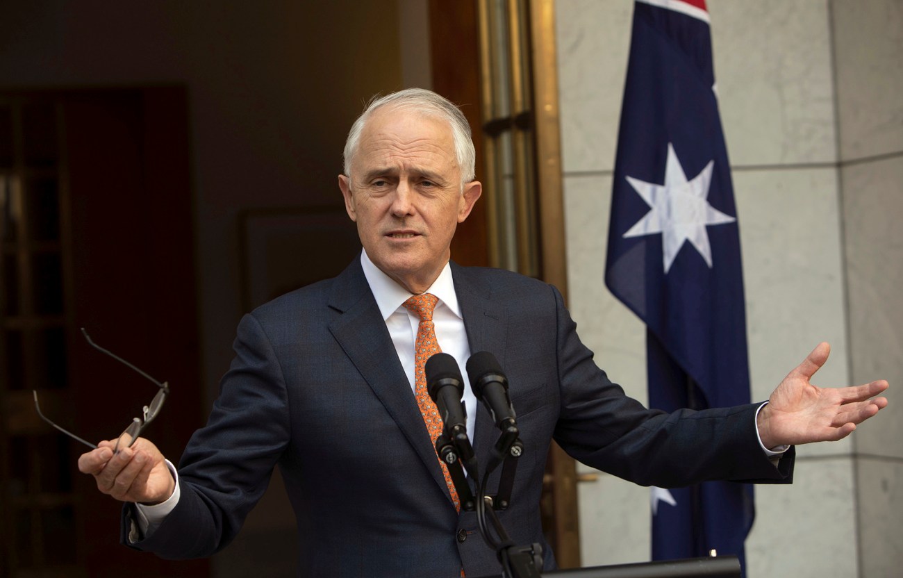 Australian Prime Minister Malcolm Turnbull holding his glasses while giving a speech.