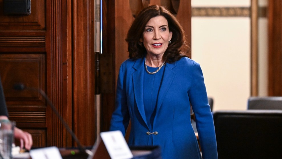 New York Gov. Kathy Hochul arrives at the Red Room at the state Capitol while wearing an all blue outfit.