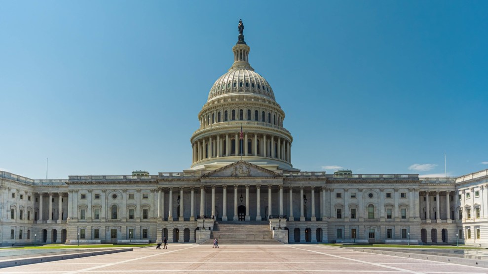 a picture of the Capitol building exterior against a cloudless blue sky