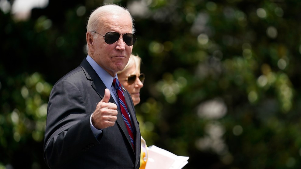 President Joe Biden gives a thumbs up as he walks with first lady Jill Biden to board Marine One on the South Lawn of the White House in Washington, Friday, July 14, 2023, as they head to Camp David for the weekend.