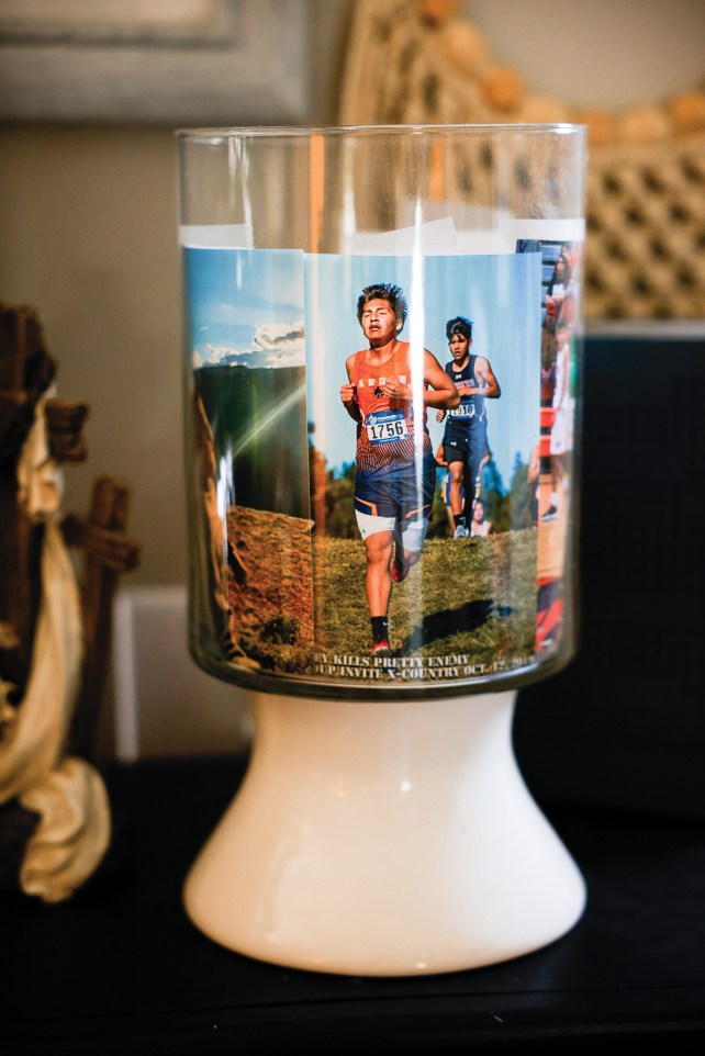 Glass with a photo of a young boy running on it.