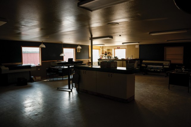 View inside an empty, former police office.
