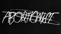 The word 'abortionist' scrawled in white, messy stylized print against a black background.