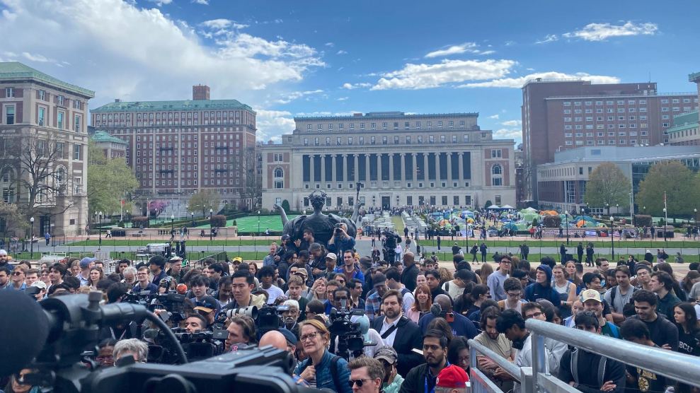 A crowd in front of Columbia University's Low Memorial Library