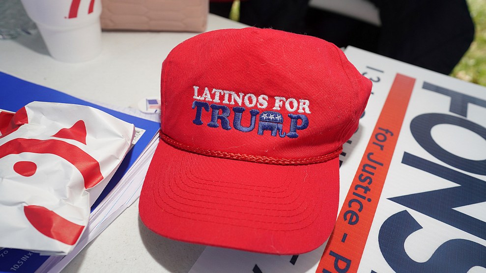 A red 'Latinos for Trump' hat