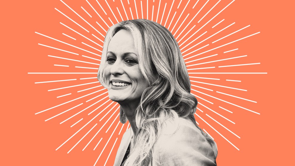 Stormy Daniels is pictured on an orange background; behind her is a white star bust design