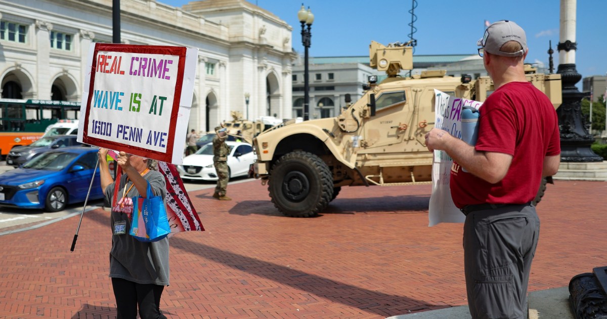 Protesters confront national guard troopers near union station in Dc.