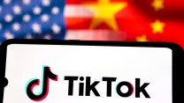 TikTok logo with American and Chinese flags behind