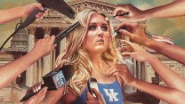 A photo illustration of a young woman with long blond hair standing in front of the U.S. Supreme Court building wearing a blue University of Kentucky swimmer’s uniform. Multiple hands surround her, holding beauty tools—a blow dryer, hair straightener, makeup brushes, a compact sponge, and a spray bottle—while another hand holds a phone and another holds a Fox News microphone toward her. The U.S. Capitol and an American flag are visible in the background.