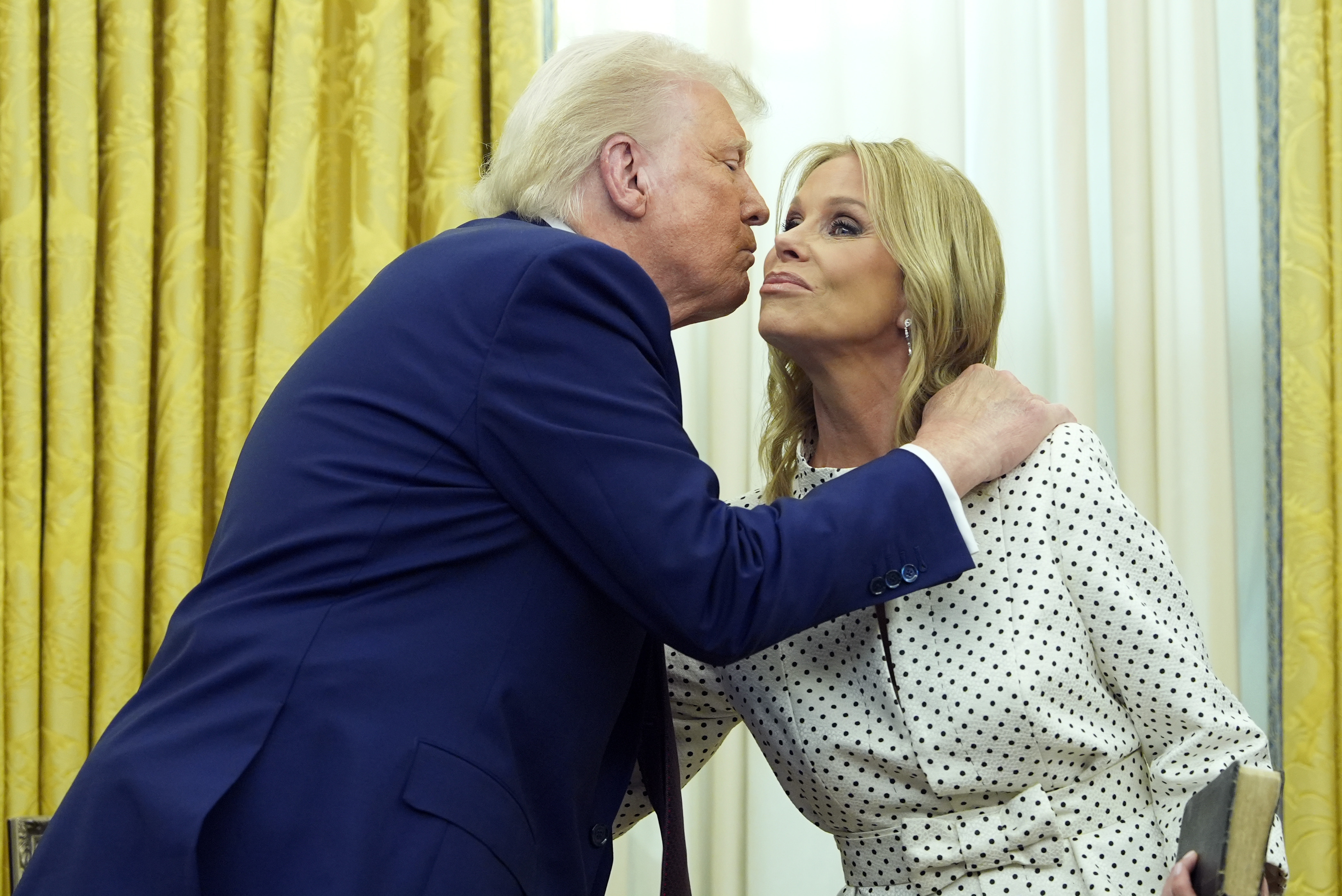 Picture of RFK Jr. covered with lipstick kisses.