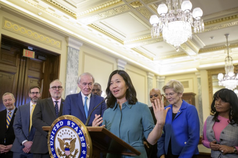 Boston Mayor Michelle Wu, center, is joined by Sen. Ed Markey, D-Mass., left and Sen. Elizabeth Warren, D-Mass., right, as she speaks during a Massachusetts Congressional Delegation press conference regarding the impacts of the Trump administration's actions on communities across Massachusetts, Tuesday, March 4, 2025, in Washington.