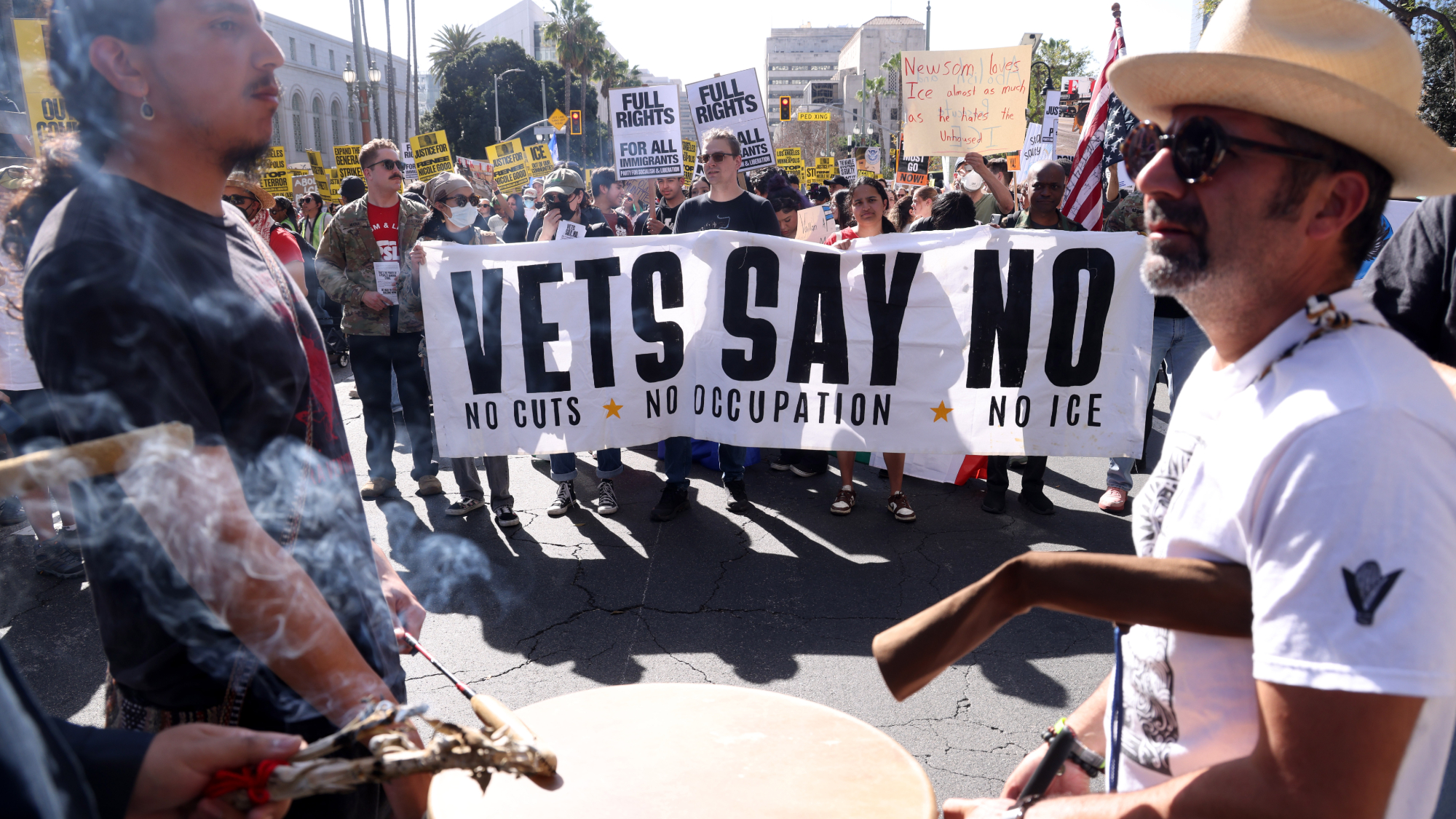 Protesters descended on City Hall Friday, Jan. 30, 2026 as part of a nationwide day of action to stop funding for ICE and the shooting deaths of Renee Nicole Good and Alex Pretti in Minnesota. Men play the drums. Veterans protest.