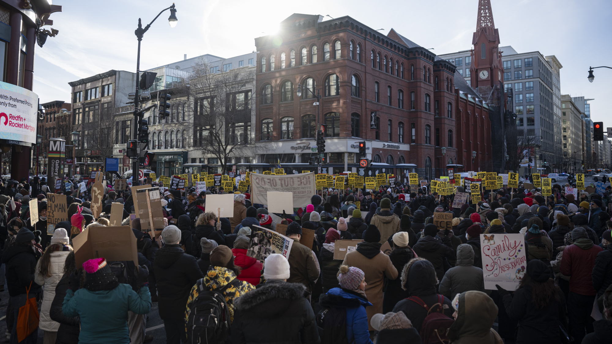 Demonstrators held a rally, holding banners and chanting slogans as they gather to protest against President Donald Trump, ICE raids, arrests, and the Trump administration around the China Town in Washington, DC, on January 30, 2026. 