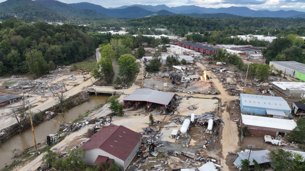 An aerial view of flooded, destroyed buildings.