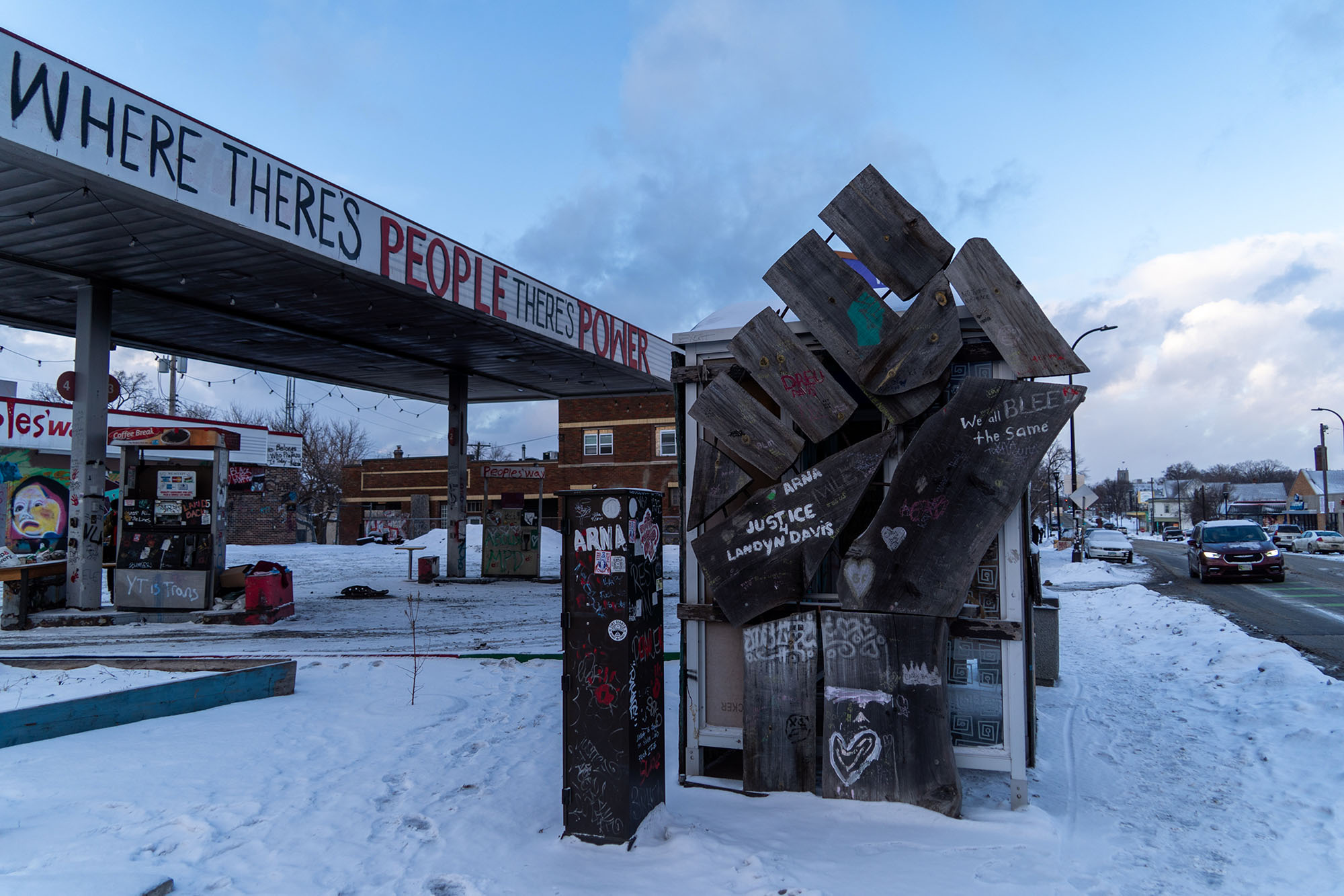 Raised fist station outside a gas station. 