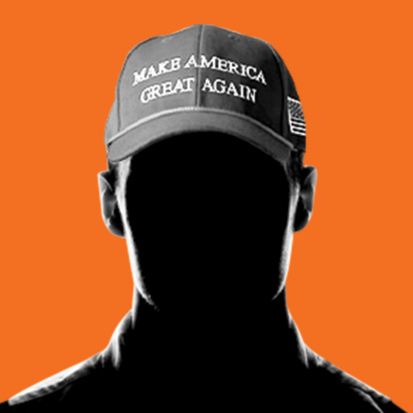 A silhouette of a man wearing a "Make America Great Again" hat