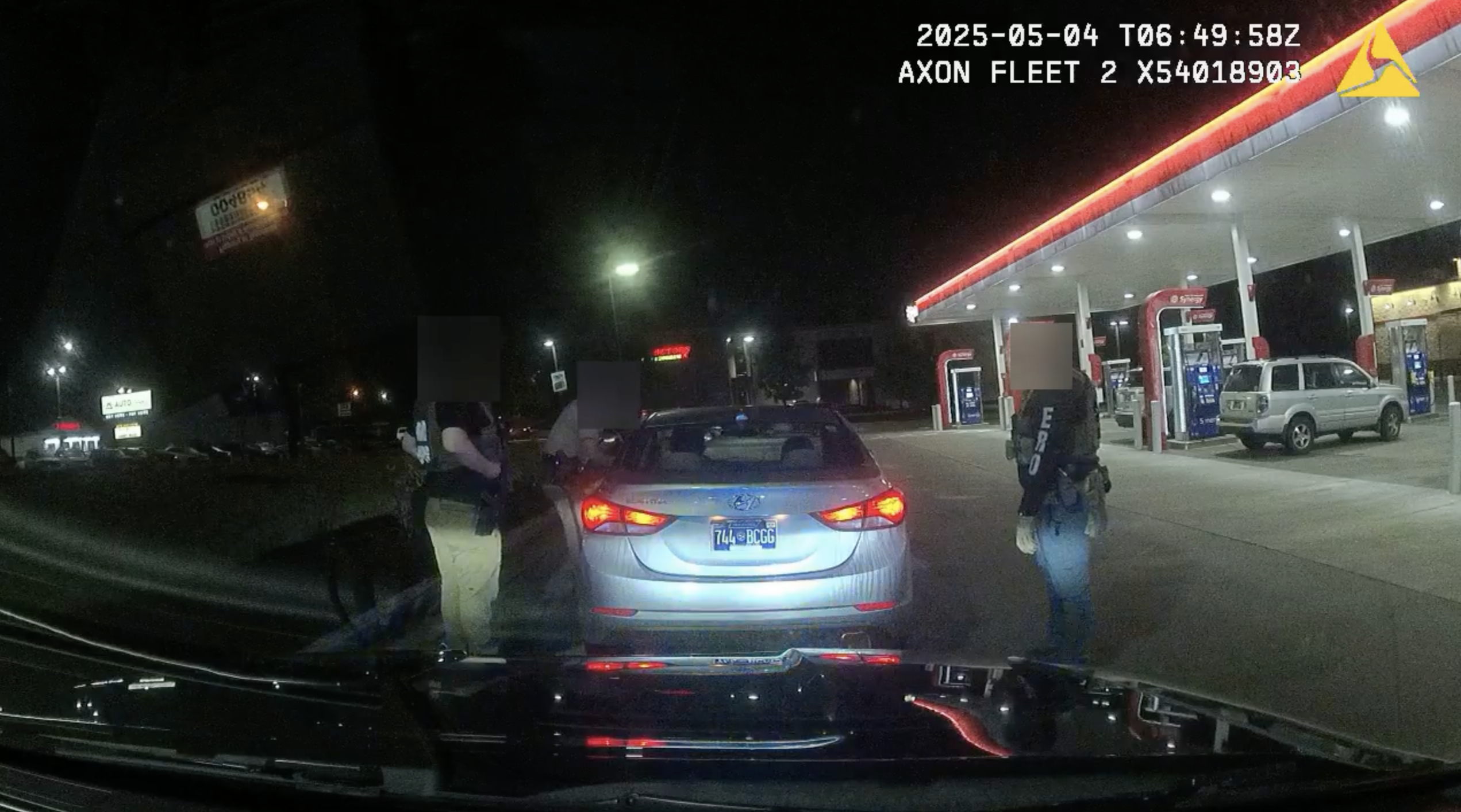 Dash cam footage of a local sheriff and ICE officers arresting a person from their car outside of a gas station.