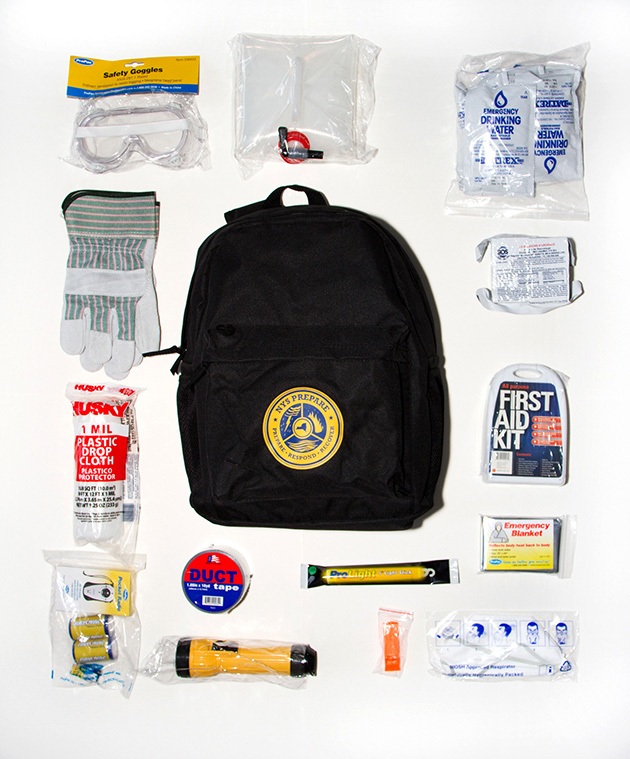  Simon's bag was prepared by Homeland Security and given to New   Yorkers after Hurricane Sandy.  In order to receive a bag you would attend a Saturday afternoon disaster preparedness seminar.  It includes safety goggles, duct tape, a whistle, MREs and water, and a first aid kit.