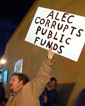 Protester at an anti-ALEC protest organized by Occupy Santa Fe in January.: suenosdeuomi/Flickr